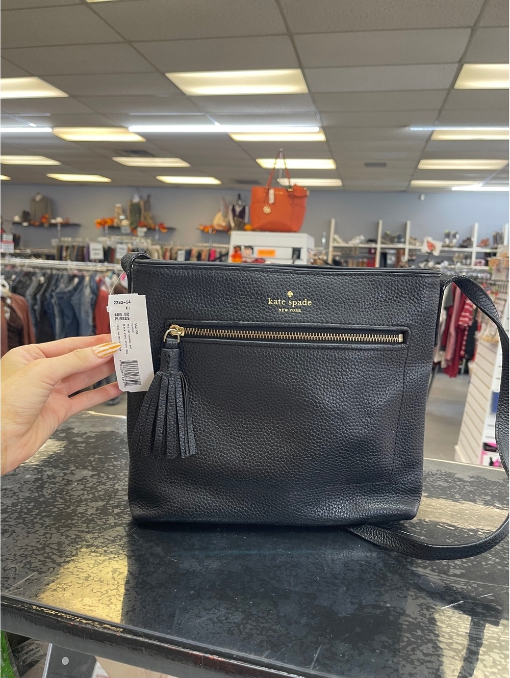 Kate Spade Black Leather Crossbody Bag with Tassel Zipper
